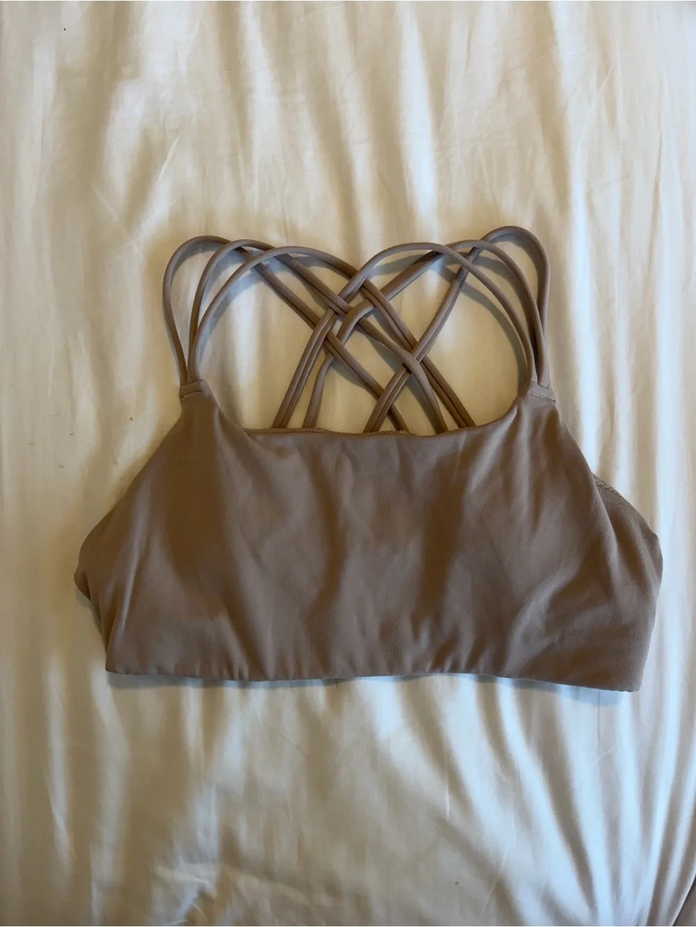 Athleta women’s strappy padded light purple mauve sports bra